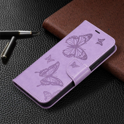 For iPhone 16 Plus Embossing Two Butterflies Pattern Leather Phone Case(Purple) - iPhone 16 Plus Cases by PMC Jewellery | Online Shopping South Africa | PMC Jewellery | Buy Now Pay Later Mobicred