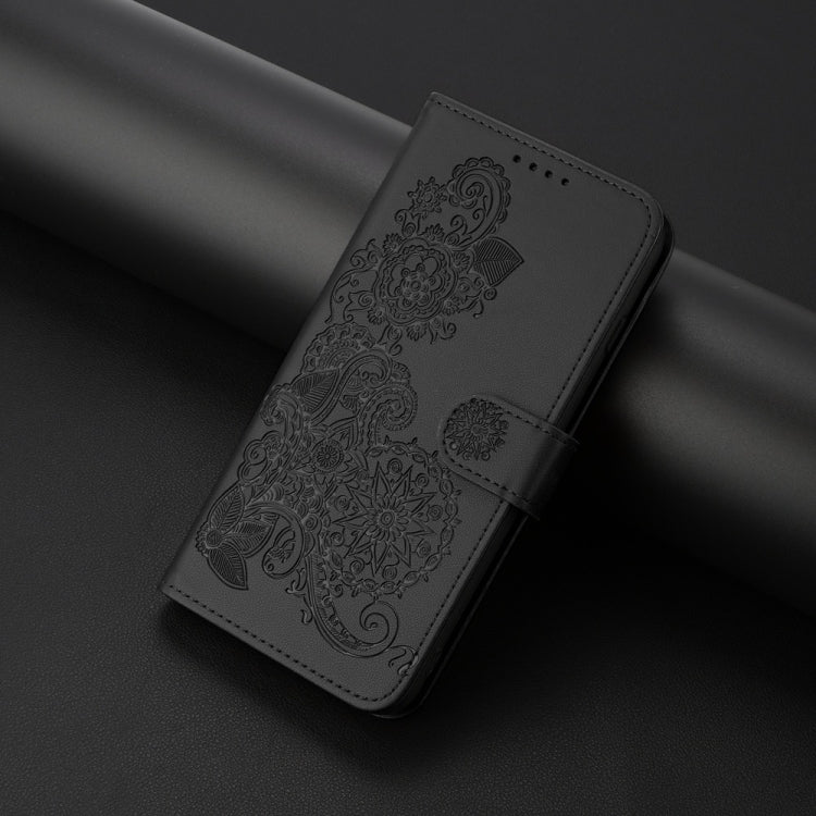 For Motorola Edge 5G 2024 Datura Flower Embossed Flip Leather Phone Case(Black) - Motorola Cases by PMC Jewellery | Online Shopping South Africa | PMC Jewellery | Buy Now Pay Later Mobicred