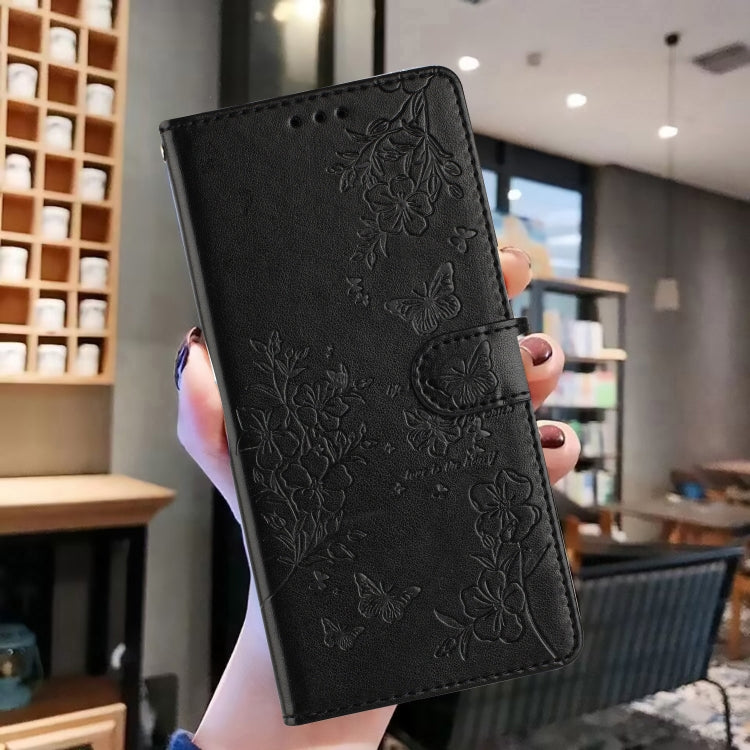 For Motorola Edge 2024 Butterflies and Flowers Leather Phone Case(Black) - Motorola Cases by PMC Jewellery | Online Shopping South Africa | PMC Jewellery | Buy Now Pay Later Mobicred