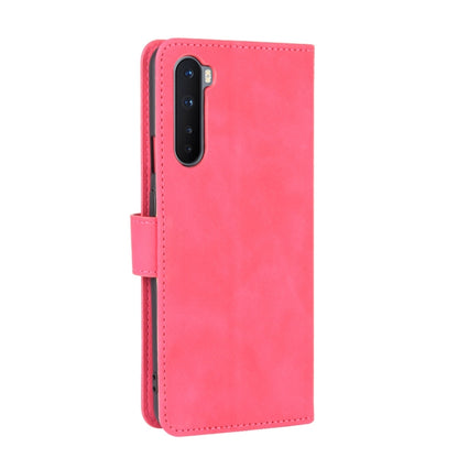 For OnePlus Nord Solid Color Skin Feel Magnetic Buckle Horizontal Flip Calf Texture PU Leather Case with Holder & Card Slots & Wallet(Rose Red) - OnePlus Cases by PMC Jewellery | Online Shopping South Africa | PMC Jewellery | Buy Now Pay Later Mobicred