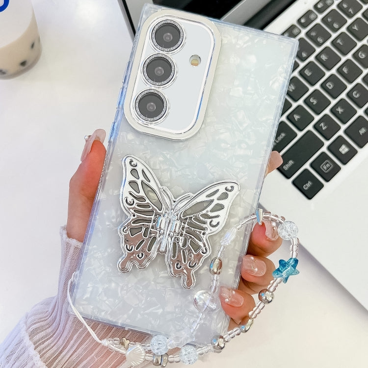 For Samsung Galaxy S25 5G Plating Glitter Lens Film Texture Butterfly Holder Wristband Phone Case(White Shell Pattern) - Galaxy S25 5G Cases by PMC Jewellery | Online Shopping South Africa | PMC Jewellery | Buy Now Pay Later Mobicred