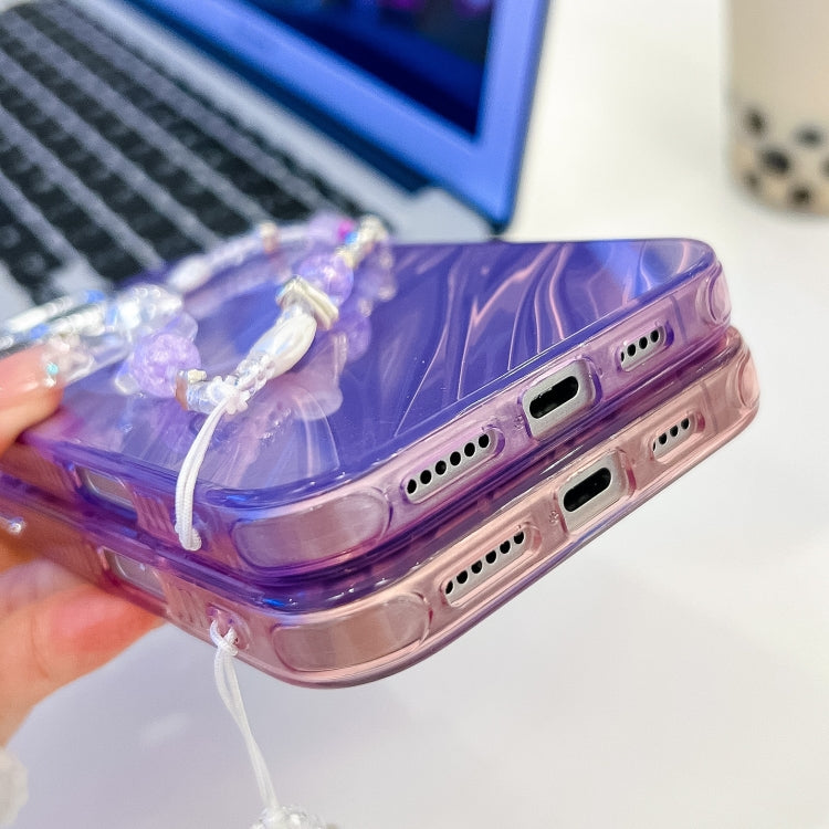 For iPhone 16 Plus Plating Texture Wristband MagSafe TPU Phone Case with Glitter Lens Film(White Shell Pattern) - free shipping - PMC Jewellery - Order now!